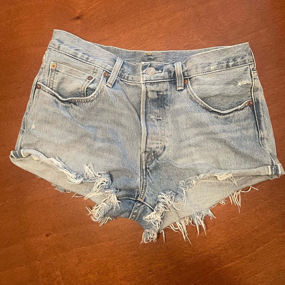 Levi’s 501 light wash denim high waisted cut off shorts
